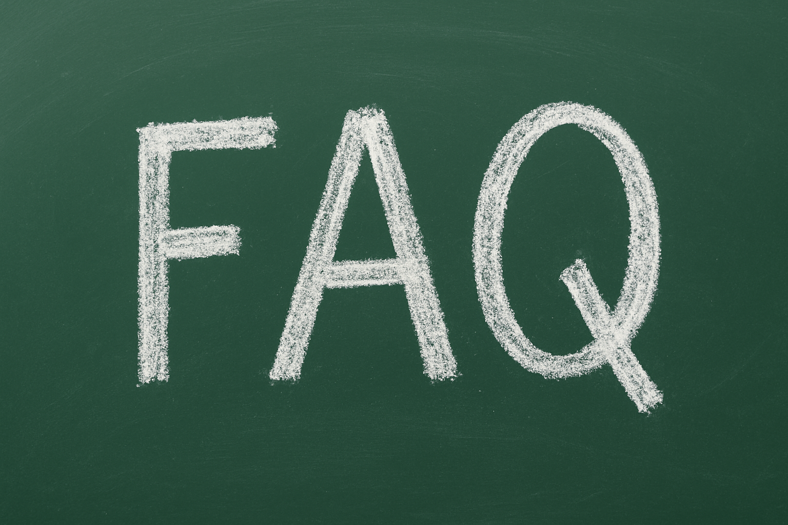 Handwritten word "FAQ" with chalk on a green board
