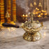 Lotus-form brass loban dan with a turned wooden handle and pierced dome