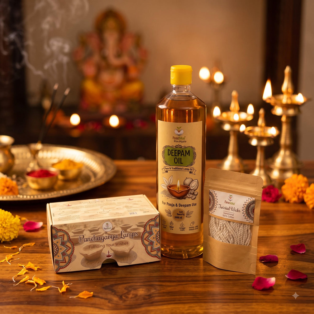 Deepam Kit: Pancha Deepam oil 1 litre, box of Panchagavya lamps and cotton twisted wicks on a pooja table with brass lamps