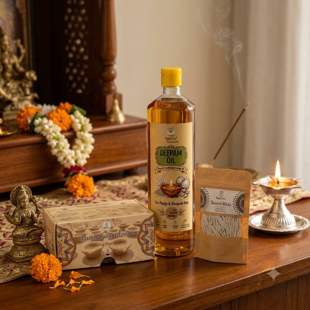 Deepam Kit on a pooja shelf: lamp oil bottle, Panchagavya lamps box and twisted wicks pouch beside a lit silver diya