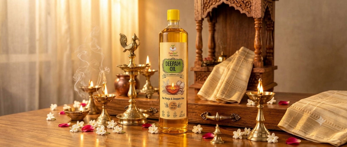 Pancha Deepam oil bottle among lit brass lamps and jasmine flowers before a wooden pooja shrine
